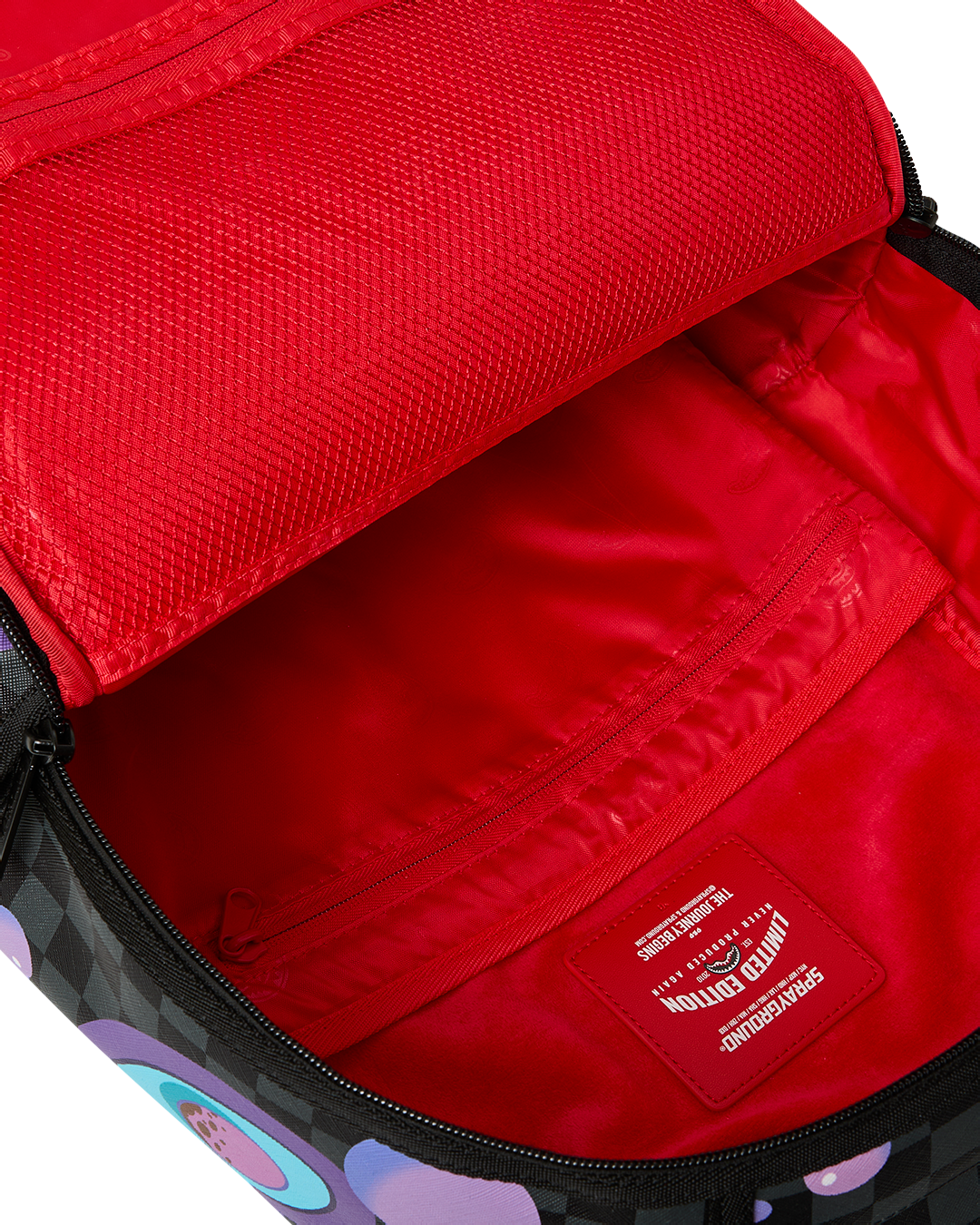 Sprayground Purple Slime Shark Backpack